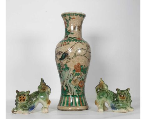 A Chinese crackle glazed porcelain vase, enamel decorated with birds amongst trees, h. 30cm, together with a pair of pottery 