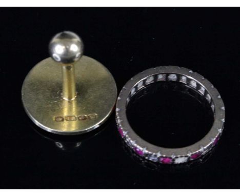A plain 18ct gold dress button, dia.2cm, 6.1g; together with a 9ct gold multi-stone eternity ring (numerous stones missing), 
