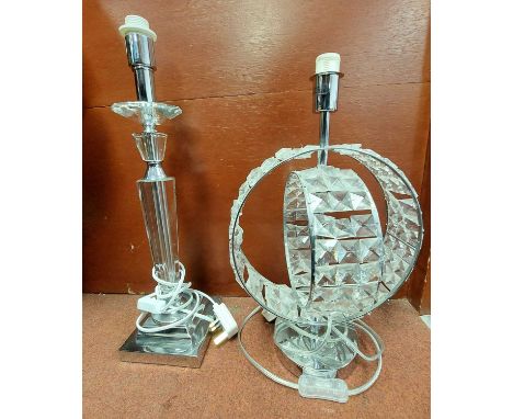 A contemporary glass and chrome table lamp in the form of a column, height 49cm, together with another