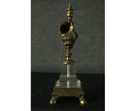 A vintage gilt metal table lamp with conch shell body raised on stepped base resting on hoof feet. H.50cm. 