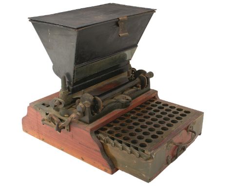 AN EXTENSIVE JAMES DIXON &amp; SONS MECHANISED LOADING SUITE, to include brass mounted mechanical iron hand cranked powder lo