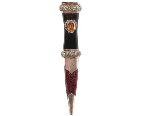 OF ABERDEEN NATIONAL RESERVE INTEREST: A SGIAN DUBH, 8.25cm fullered blade with faceted back edge, the white metal mounted hi