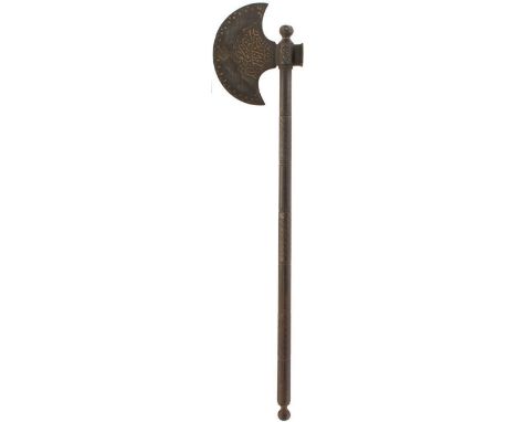 A 19TH CENTURY OTTOMAN AXE, 73cm over all, 17.5cm crescent form head chiselled with calligraphy and foliage, highlighted in b