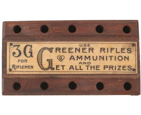 A GREENER FIRING POINT AMMUNITION STAND, for .22 calibre containing two various .22 cleaning accessories, together with a twi