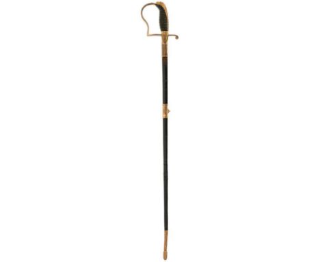 AN EARLY 19TH CENTURY MIDSHIPMAN'S HANGER, 65.75cm fullered blade, patinated, regulation copper gilt stirrup hilt, the langet