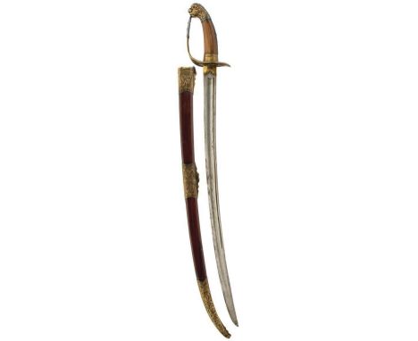 A 19TH CENTURY VIETNAMESE SWORD OR GUOM, 62cm curved fullered European blade, characteristic brass mounted hilt with slotted 