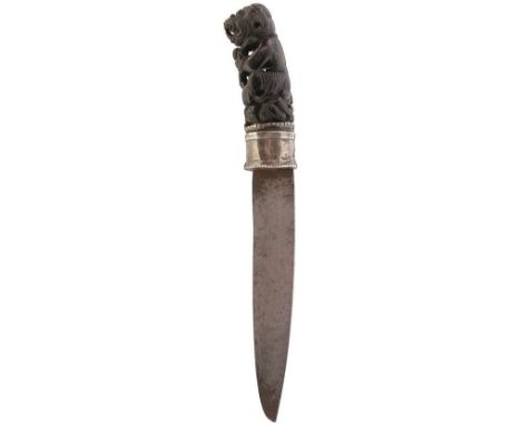 A 19TH CENTURY BURMESE DHA OR SHORT DAGGER, 17cm slightly curved blade, characteristic white metal mounted hilt, the carved h