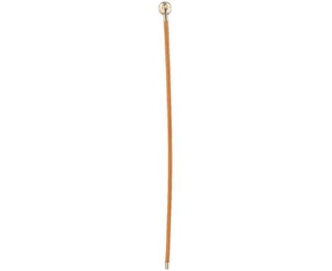AN OFFICER'S SWAGGER STICK OF THE ROYAL SCOTS, characteristic pale wood haft with white metal mounts, the spherical pommel de