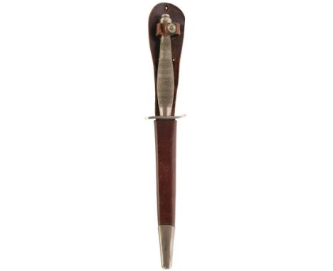 A FIRST PATTERN FAIRBAIRN-SYKES COMMANDO KNIFE, 17.5cm flattened diamond section blade etched with the Wilkinson and F-S pane