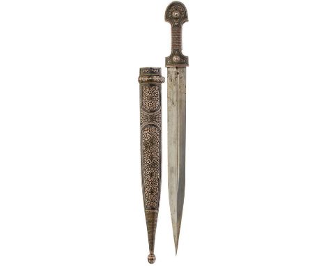 A LARGE CAUCASIAN KINDJAL, 38.5cm blade with offset deep fullers, characteristic silver niello and filigree hilt with large d