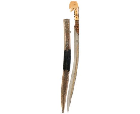 A 19TH CENTURY TURKISH OR OTTOMAN YATAGHAN, 61cm curved fullered blade decorated with a long panel of calligraphy in gold to 