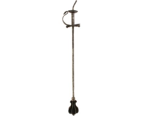 A 19TH CENTURY INDIAN MACE, 80.5cm over all, the shaped flanged head with dome terminal, tapered and ring turned haft incised