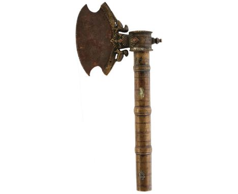 A DECCAN INDIAN AXE, 13cm steel head incised with two circles to either side, the brass mount decorated with geometric design