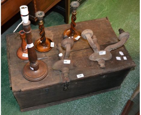 A Victorian oak chest, hinged top, candle box inside; a pair of oak helical candlesticks; two stripped oak wall sconces; an o