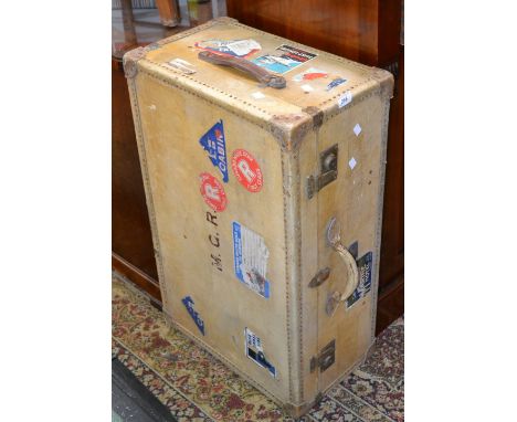 A large Watajoy travelling trunk, a variety of labels including Cunard White Line, Marine Hotel, Cape Town; etc 