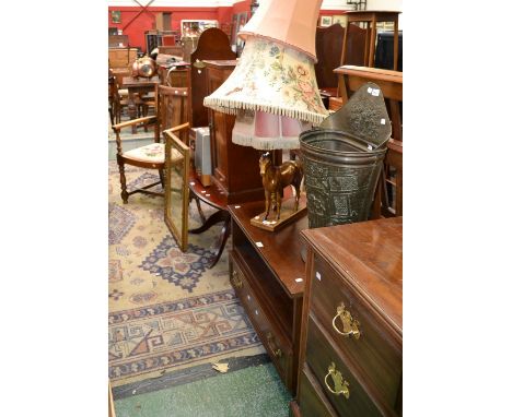 An oak carver dining chair; a reproduction oval mahogany coffee table; a cheval mirror; a gilt framed wall mirror; two sewing