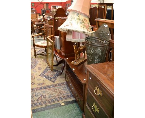 An oak carver dining chair; a reproduction oval mahogany coffee table; a cheval mirror; a gilt framed wall mirror; two sewing