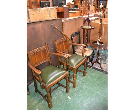 A mahogany smoker's stand/standard lamp; an ebonized Edwardian bedroom chair; a reproduction wine table; a reproduction jardi