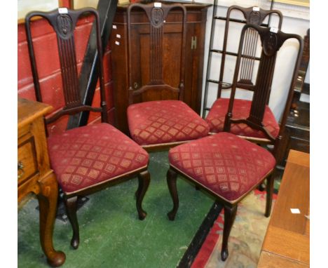 A set of four 1930's Art nouveau style mahogany dining chairs 