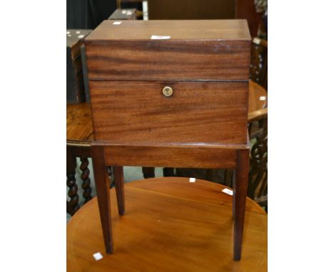 A mahogany tea caddy on stand 