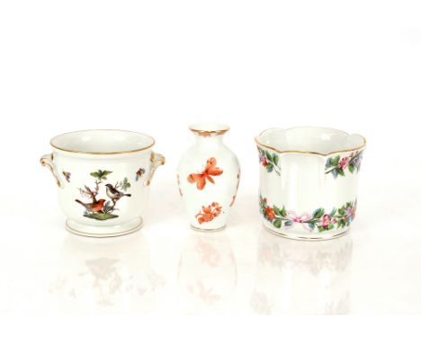 Two Herend porcelain jardinière, one with floral decoration the other decorated birds and insects in the Meissen style; and a