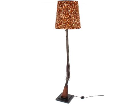 A novelty standard lamp,&nbsp;made from a double barrelled hammer shot gun (with de-activation certificate) the shade made of