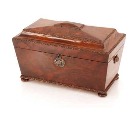 An Early 19th Century mahogany&nbsp;sarcophagus&nbsp;shaped tea caddy,&nbsp;with twin compartments, 33cm&nbsp;