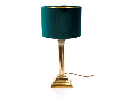 A brass Corinthian column table lamp, with green shade, 52cm high