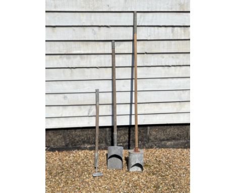 A WWII British Civil Defence Home Front incendiary bomb clearing set consisting of scoop and hoe, both mounted on poles which
