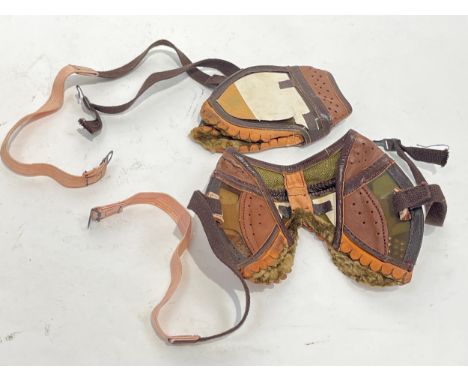 Two pairs of WWII US goggles, unused, by Gold Seal Shoe Co., dated 1943. From the estate of S/SGT K. WARNER 983226. Other lot