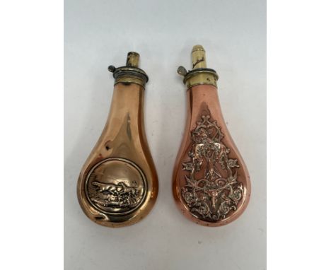 A James Dixon of Sheffield copper powder flask with game design, together with another with hound design (2)