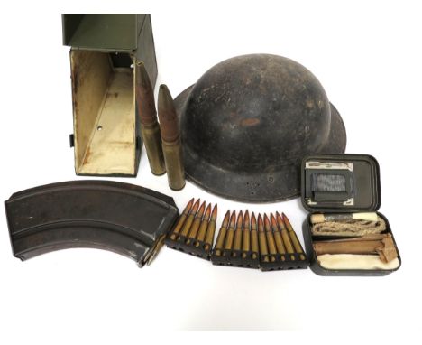 A WWII British Brodie helmet with liner and chinstrap, together with a Bren mag and various deactivated ammunition