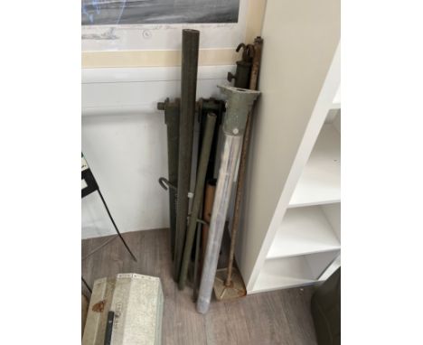 A quantity of Military equipment including gunsight and tripod parts