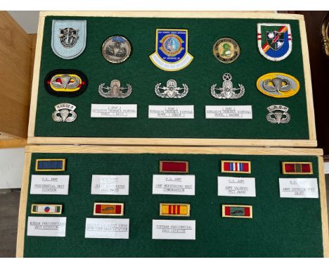 A collection of United States Army Insignia and crests
