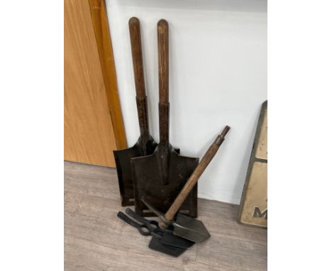 Two military entrenching shovels together with three entrenching tools (one with handle) (5)