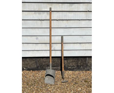 A WWII British Civil Defence Home Front incendiary bomb clearing set consisting of scoop and hoe, both mounted on poles which