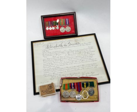 A George VI and later medal group of five consisting of WWII War Medal, Defence Medal, Elizabeth II Coronation Medal, EIIR Ef