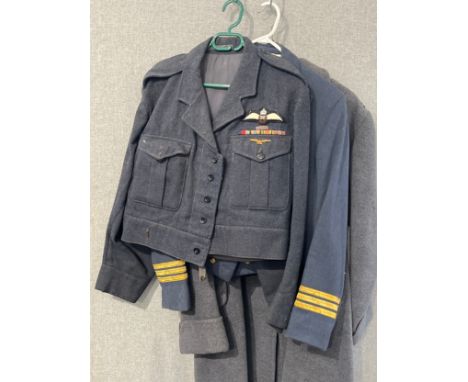 A George VI 1951 dated battledress blouse with insignia (including Military Cross and Air Crew Europe star), together with a 