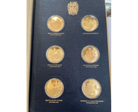 A folder of Churchill Centenary sterling silver gilt medals, 1973 celebrating the 100th anniversary of the birth of Winston C