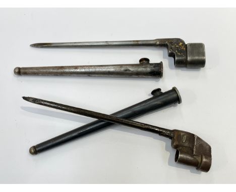 A British No.4 Mk II plug bayonet with sheath and another similar