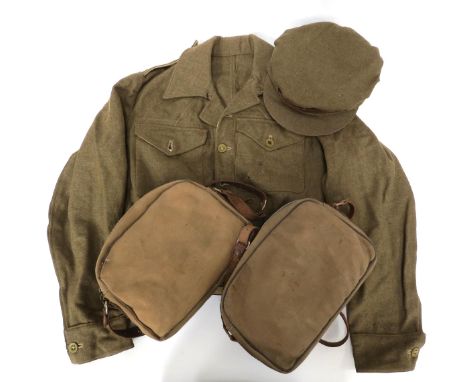 A WWII 1942 dated (0) ATS peaked cap with badge, together with two ATS handbags and a 1950's WRAC blouse (4)