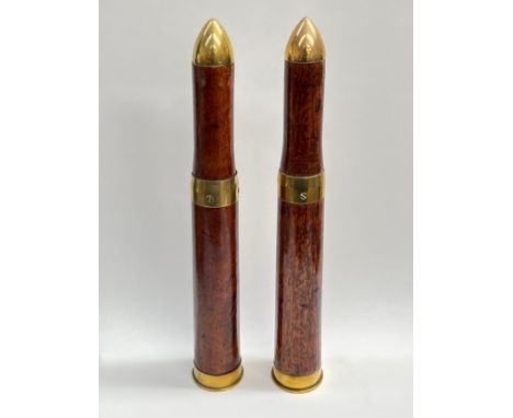 A pair of WWII hardwood and brass mounted drill round shells, both dated 1942, marked 6PR G&T