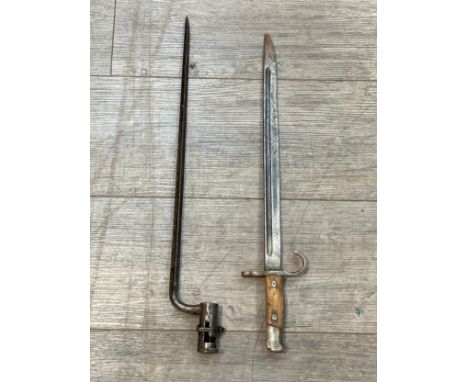 A Japanese 30 year type bayonet, no scabbard, together with a socket bayonet (2)