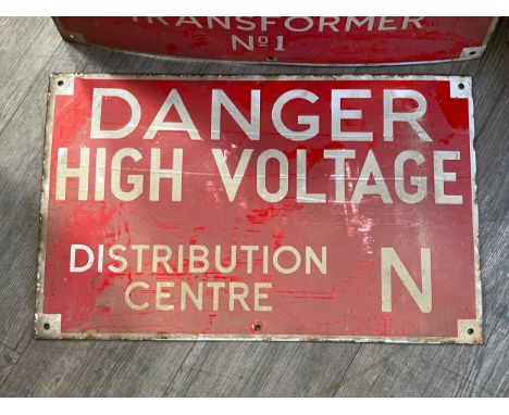 Two airbase electricity enamel signs: DANGER HIGH VOLTAGE TRANSFORMER NO. 1 and DISTRIBUTION CENTRE N