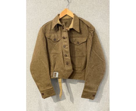 A WWII British battledress blouse, size no. 13, John Hammond &amp; Co. Ltd., dated 1943