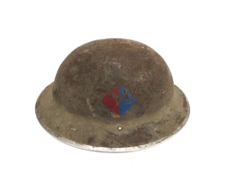 A WWII British Royal Artillery marked Brodie helmet, regimentally marked with red and blue diamond insignia of the Royal Arti