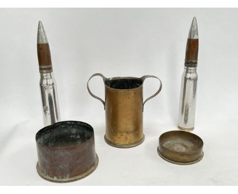 A quantity of shell case parts including trench art twin handle vase 8/16, together with two drill shells (5)
