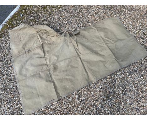 A WWII waxed cape / groudsheet circa 1941-44. From the estate of S/SGT K. WARNER 983226. Other lots from the same estate are 