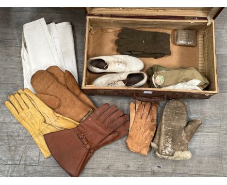 A suitcase of gloves including dispatch riders, mittens a/f, an apron etc. From the estate of S/SGT K. WARNER 983226. Other l