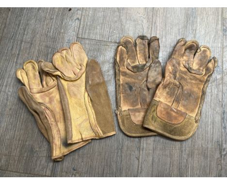 Two pairs of similar WWII US heavy suede leather gloves, one marked M (Medium) 73-G-30508, dated 1942. From the estate of S/S